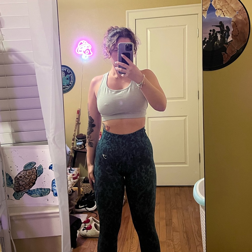 Gymshark Adapt Camo Seamless leggings and sports bra in the color green